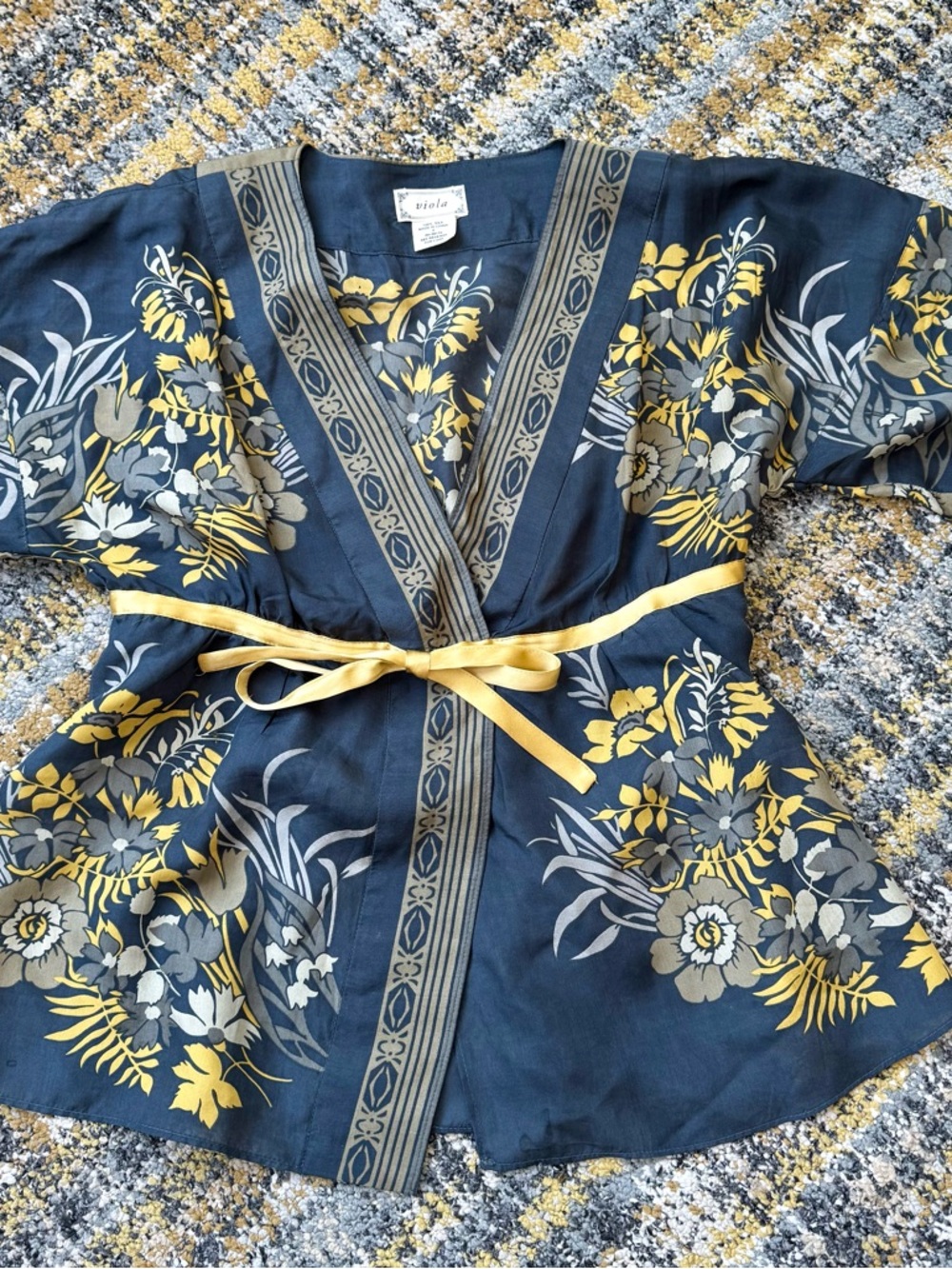 Viola brand from Anthropologie Navy Floral Wrap Top with Yellow Tie